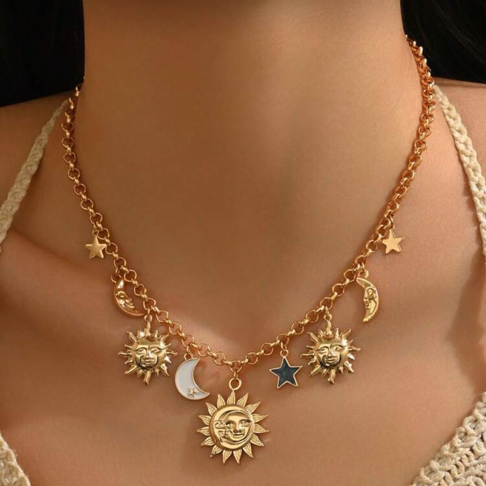 Gold tone Sun and Moon Charm Necklace